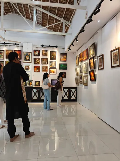 Visitors and artists mingle at the "Tune of Inner Journey" exhibition. Our gallery events are a wonderful opportunity for art lovers to connect with creators and discuss the stories behind the art.