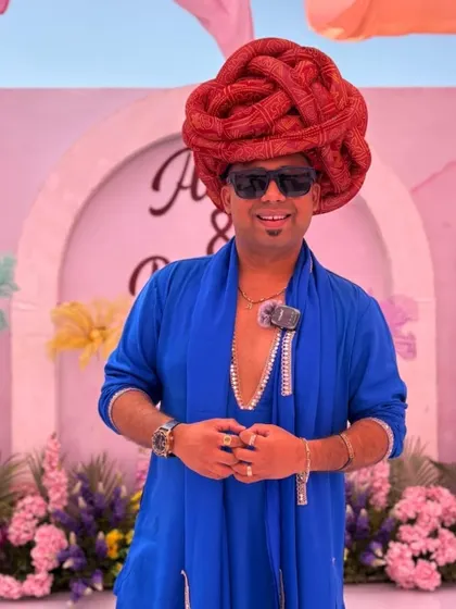 Rocking a royal blue kurta and a traditional Rajasthani turban for a Haldi event. My outfits are always part of the performance, matching the theme and energy of the day.
