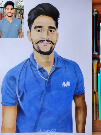 A simple and strong portrait of a man in a polo shirt, drawn on A3 paper. The bright blue of the shirt makes this colored pencil drawing pop.