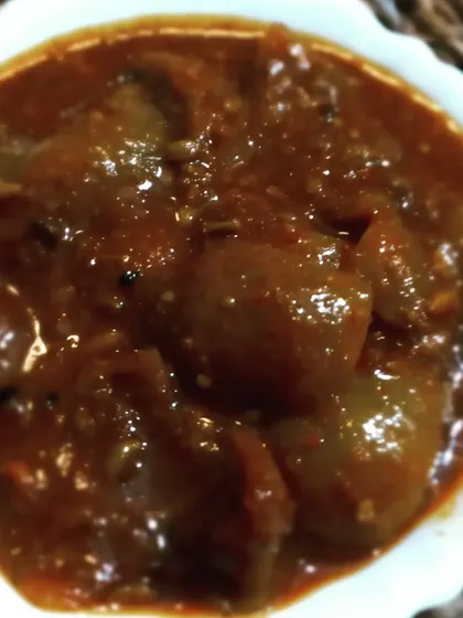 The rich, dark texture of my sweet and spicy Lemon Pickle. It is aged to perfection to get that soft texture and deep flavor.