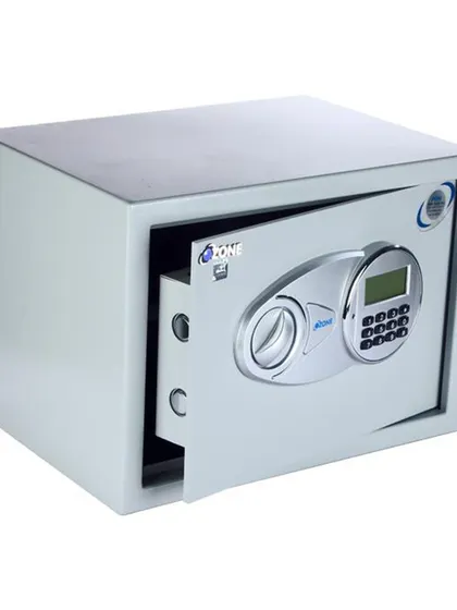 An interior view of the Tusker-44 safe, showing its spacious design and strong locking bolts. This model is perfect for those needing a mid-sized locker with reliable digital access and a manual key backup.