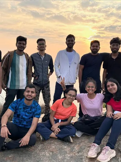 Our group enjoying the sunrise at the peak of Kaiwara Betta.