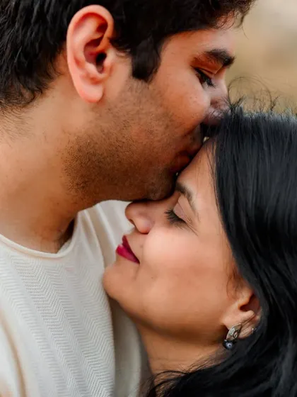 Sometimes the most powerful portraits are the quietest. This intimate, close-up moment during an outdoor session captures the gentle and soulful side of a relationship, focusing purely on the connection between two people.