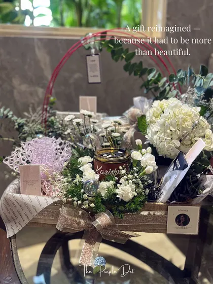 This gift was reimagined to be more than just beautiful; it had to tell a founder's story. It is a testament to my process, where I blend your vision with layers of texture, fresh hydrangeas, and personalized details until the gift feels true to the moment.