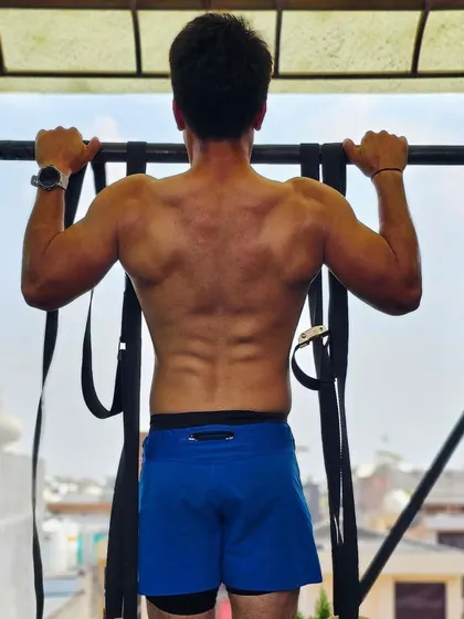 A shot of my back during a pull up. Building a strong posterior chain is fundamental to overall strength and performance.