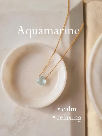 This is my 'Badamcha' Aquamarine heart-shaped drop pendant. It's a simple, elegant piece for carrying calming and relaxing energy.