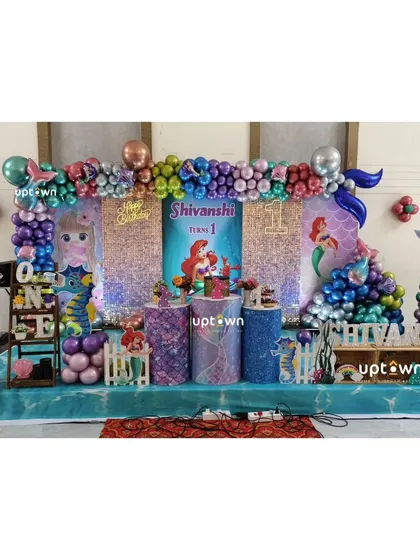 An underwater adventure with this Little Mermaid theme for a first birthday.