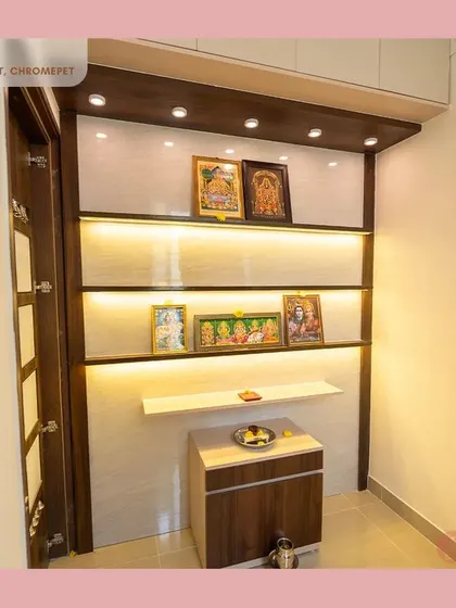 This pooja unit in Chromepet is designed for modern devotion, with back-lit shelves, a compact storage cabinet, and a clean, elegant aesthetic.