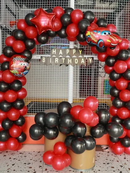 A full view of our "Cars" themed balloon arch, creating an exciting entrance for all the little racers attending the party.