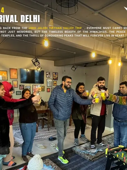 The trip doesn't end when you reach the destination. Here's our group toasting in a cozy cafe in Jibhi, celebrating the journey and the new friendships made.