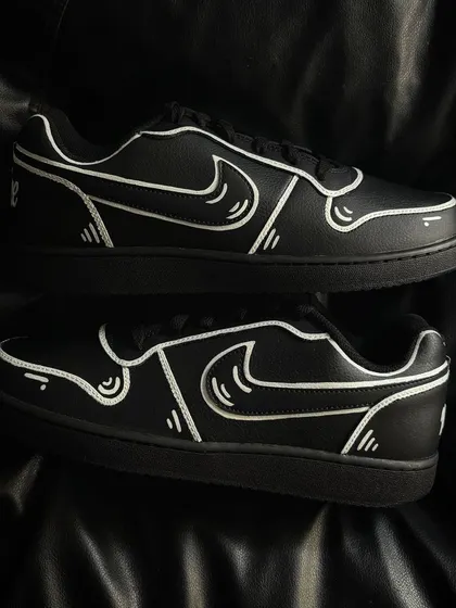 Another pair shot of the cartoon custom sneakers.