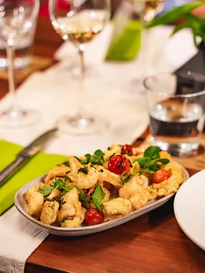 A beautifully plated dish of our fried appetizers, showcasing the care we put into presentation, even for small plates.