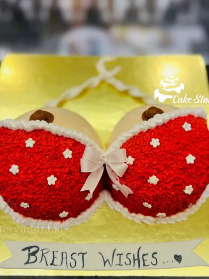 "Breast Wishes!" A playful bra-shaped cake for a groom-to-be's bachelor party.