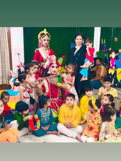 A group photo from our "Natkhat Kanha" Janmashtami workshop. The children gathered to watch a live Radha-Krishna performance, completely captivated by the magic.