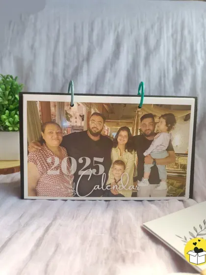 A straight-on view of the 2025 calendar cover, showcasing a beautiful family portrait. This makes a wonderful personalized gift.