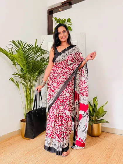 This is a cotton mulmul Kalamkari saree from Meesho, priced under 599. The combination of red, black, and white is timeless. The fabric is super soft and perfect for all-day comfort.
