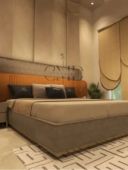 Another angle of the master bedroom, highlighting the dramatic curtains and exquisite marble flooring with intricate geometric inlays.