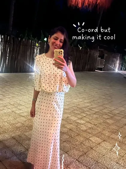 Making a co-ord set look cool for a Goa night out. This polka dot top and matching skirt create a playful yet put-together look that's perfect for dinner.
