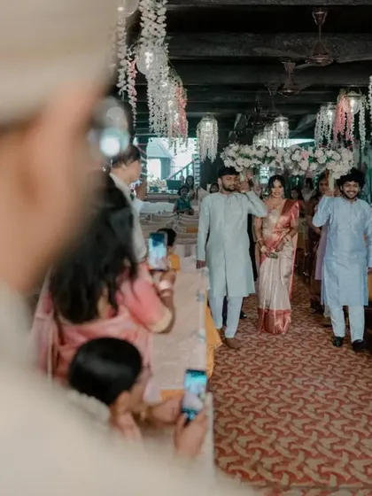 A unique perspective of the bride's entrance, seen from the groom's point of view.