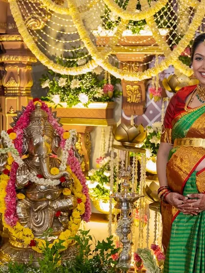 A close-up of the mother-to-be next to a Ganesha idol, an important part of the traditional ceremony. We ensure every detail is culturally significant and beautifully presented.