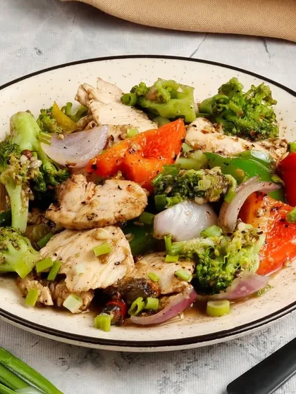 Our chicken and broccoli stir-fry, a balanced dish combining lean protein with fresh, crunchy vegetables.