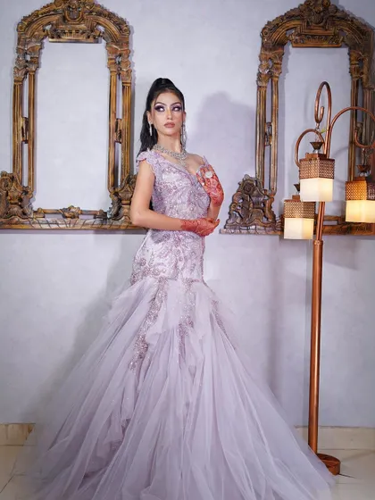 A final full-length shot of the lilac gown, a chic and modern choice for any party.