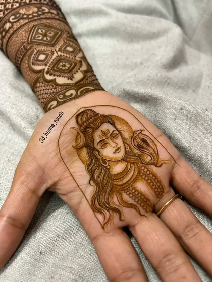 A close-up of a beautifully detailed portrait of Lord Shiva. The fine lines and shading capture a serene and powerful expression, showcasing our skill in figurative art.