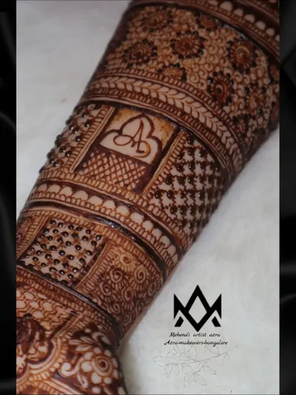 Another example of personalized initials 'A' and 'B' included in the bridal arm band design.