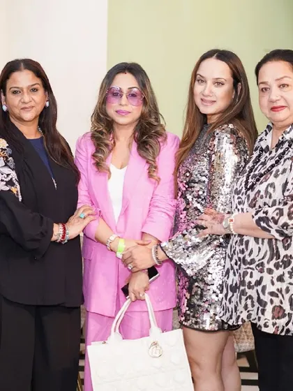 A group of well-dressed ladies enjoying the party atmosphere. Our venue is a premium space for stylish celebrations.