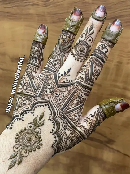 A closer look at the intricate finger details and shading in this classic design.