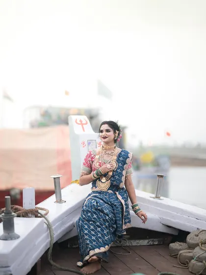 My Koli girl on a boat. The location adds so much authenticity to this traditional look.