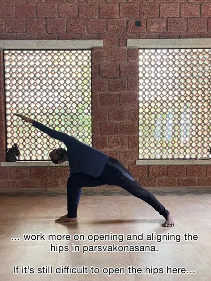 If you find it difficult to open the hips in Parsvakonasana even with the hand inside the foot, focus on the alignment and hip-opening action of the pose without going to your maximum depth.