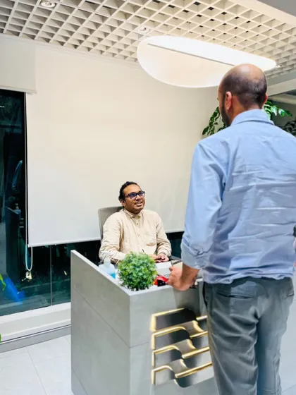 Our staff is always ready to assist you. Here's a glimpse of a consultation at our front desk.