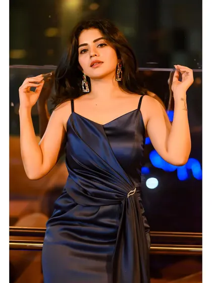Another beautiful shot of Pavithra Gowda. The simple elegance of this navy satin gown makes it a timeless piece for any wardrobe.