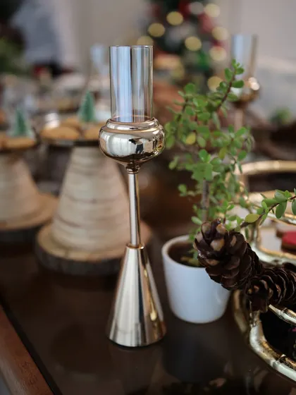 A single tube from our Vesper Quintet candle holder, shown here as a standalone piece. Its elegant design makes it a stunning centerpiece even on its own.