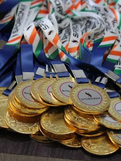 A pile of Sportonix medals, ready to celebrate the achievements of many more champions.