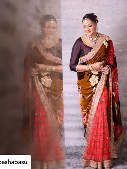 Another artistic shot of Bipasha Basu, playing with reflections to create a dreamy and ethereal portrait.