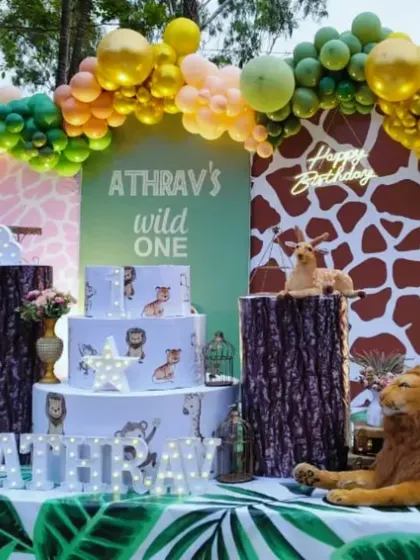 We took the party outdoors with this "Wild One" jungle-themed birthday. The setup includes lush greenery, animal print backdrops, and character cutouts, all designed to create an immersive safari adventure for the little one and their guests.
