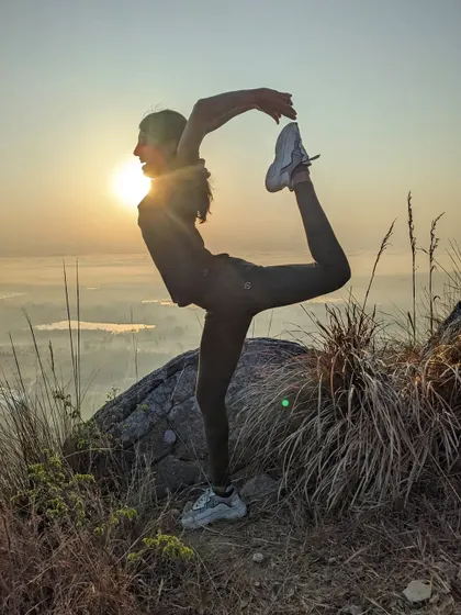 The sweet struggle of trying Natarajasana at 6am mid-trek. The sunrise views were just so gorgeous, I had to try.