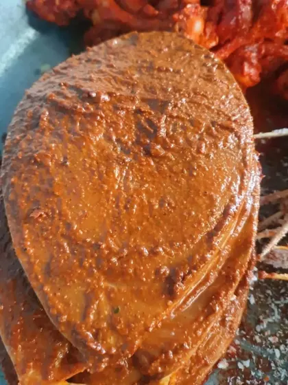 A close-up of the thick masala paste we use for our fish fry. It's packed with spices.