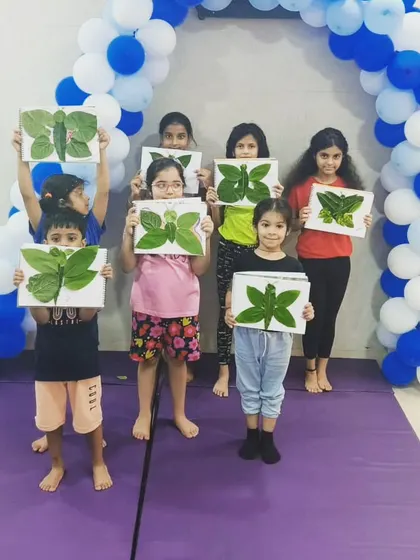 We took our art class outdoors to connect with nature. The kids gathered leaves and turned them into beautiful butterfly art, learning about the environment while making something amazing.
