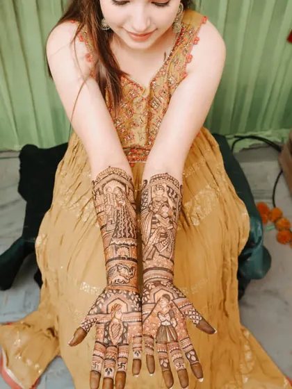 The full view of her stunning bridal mehendi, a true reflection of love's timeless beauty.
