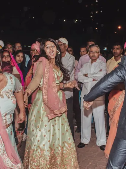 That moment when friends and family own the dance floor. These candid shots of wedding guests having a blast are essential parts of the story.