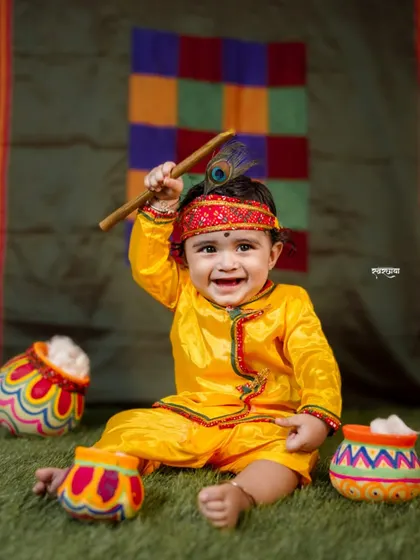 Look at this little Kanha! Themed baby photoshoots for festivals like Janmashtami are so much fun. My focus is on making the baby comfortable and capturing their delightful expressions, creating adorable memories for the parents.