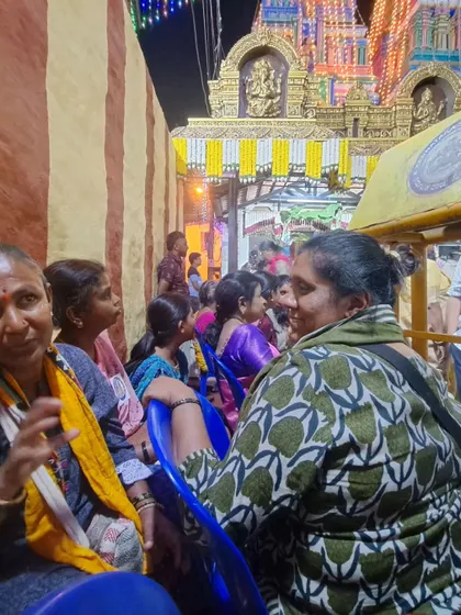 Finding a safe spot to sit and watch the proceedings, soaking in the stories and snippets from fellow devotees.