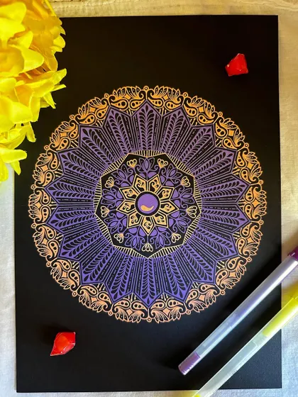 The first in a Gelly Roll series, this mandala uses a beautiful combination of purple and orange. I love how the colors blend and create a warm, sunset-like glow.