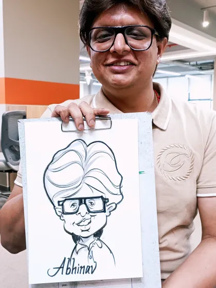 A smiling employee from a corporate event for Lotusflare. A quick, fun caricature is a great desk accessory and a reminder of a fun day at the office.