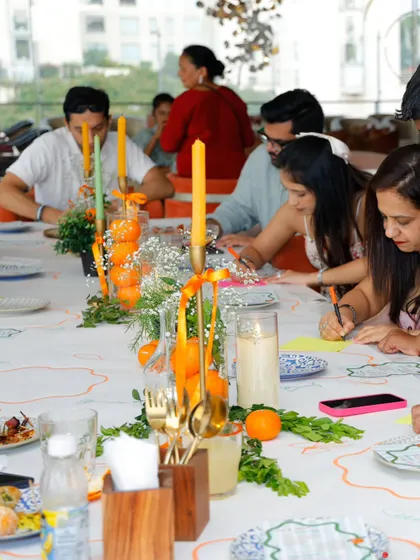 Guests enjoyed an interactive element at the baby shower, coloring in designs on the custom paper tablecloth while they chatted and celebrated the parents-to-be.