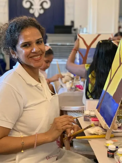 A happy participant at the Kochi workshop. Her smile captures the fun and relaxed atmosphere of our events.
