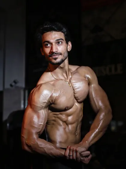 Another angle of the side chest pose. This isn't peace, it's preparation for what's to come.